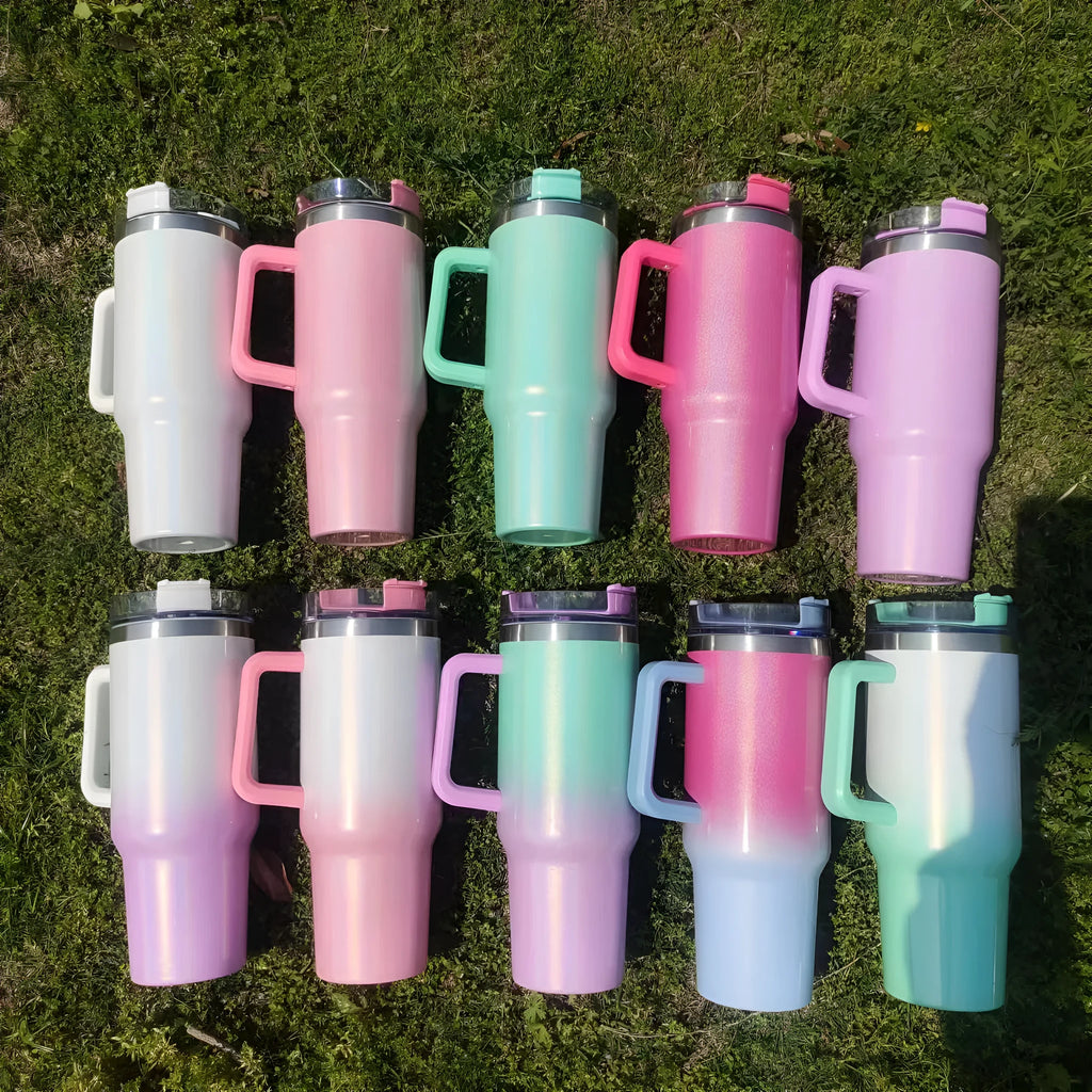 Large stainless steel vacuum insulation cup with gradient colour finish showing double-layer construction