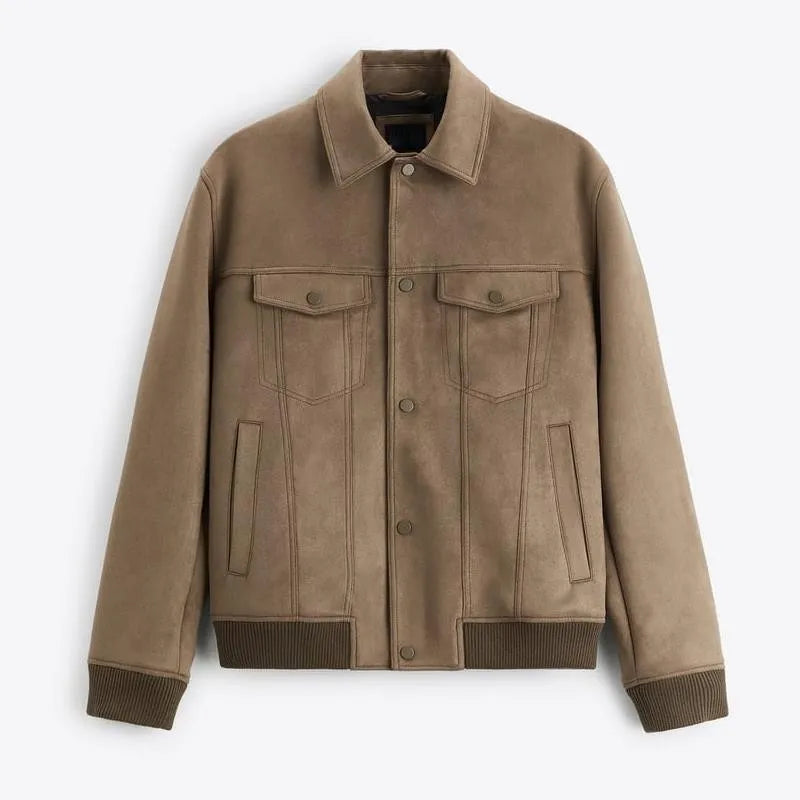 Women's light grey suede velvet jacket with long sleeves, showing a British-style cut.
