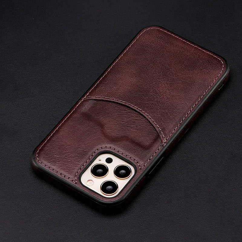 Dark blue PU leather protective case for iPhone models 7 through 14 Pro Max on a table.