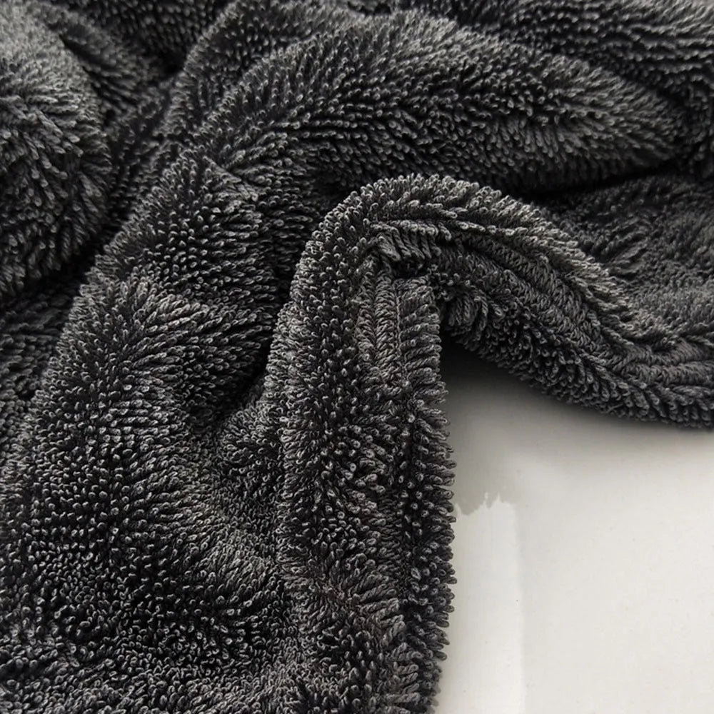 Grey microfiber car wash towel lying flat, showing its 40x40cm square size.