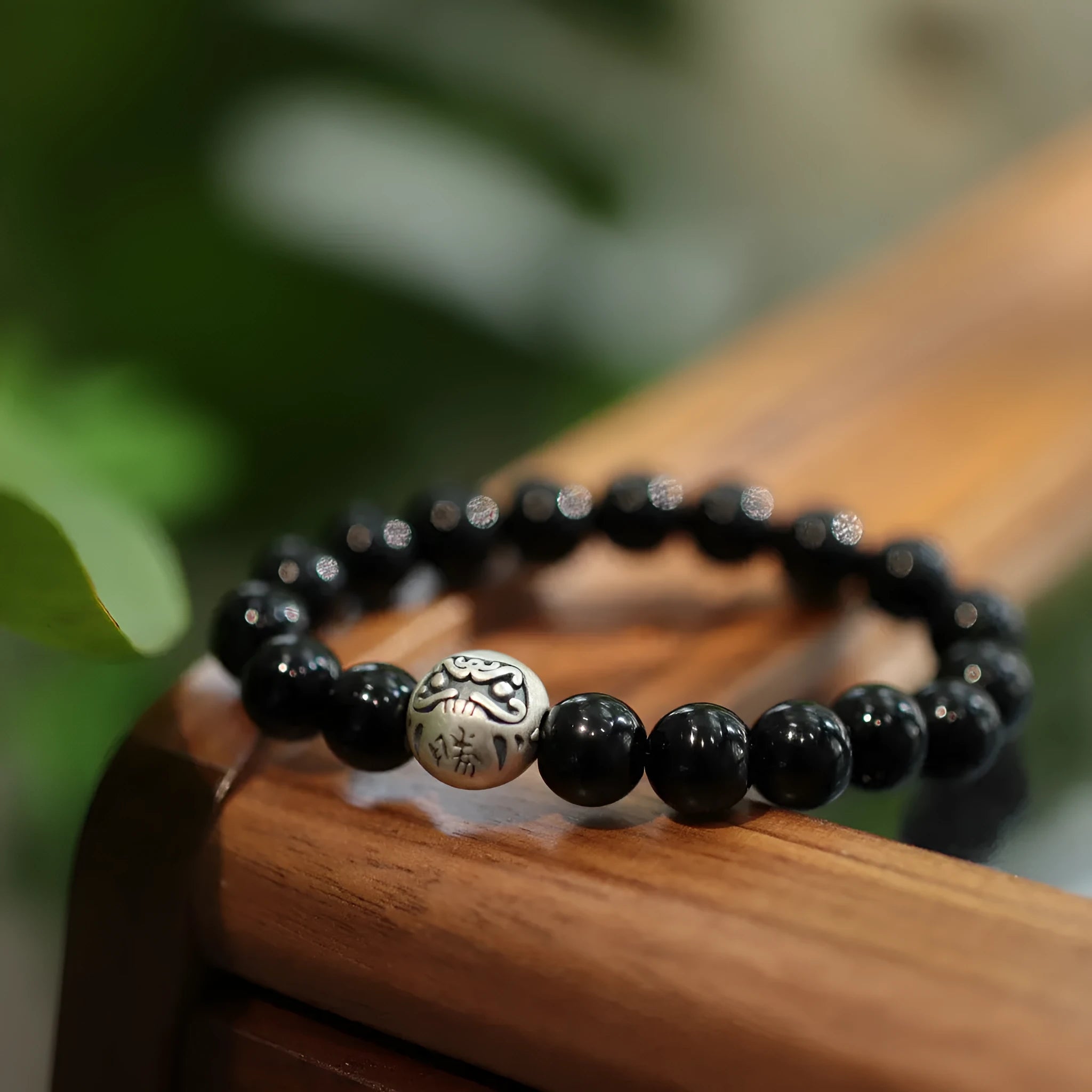 Women's black agate bracelet with 10mm beads and sterling silver clasp