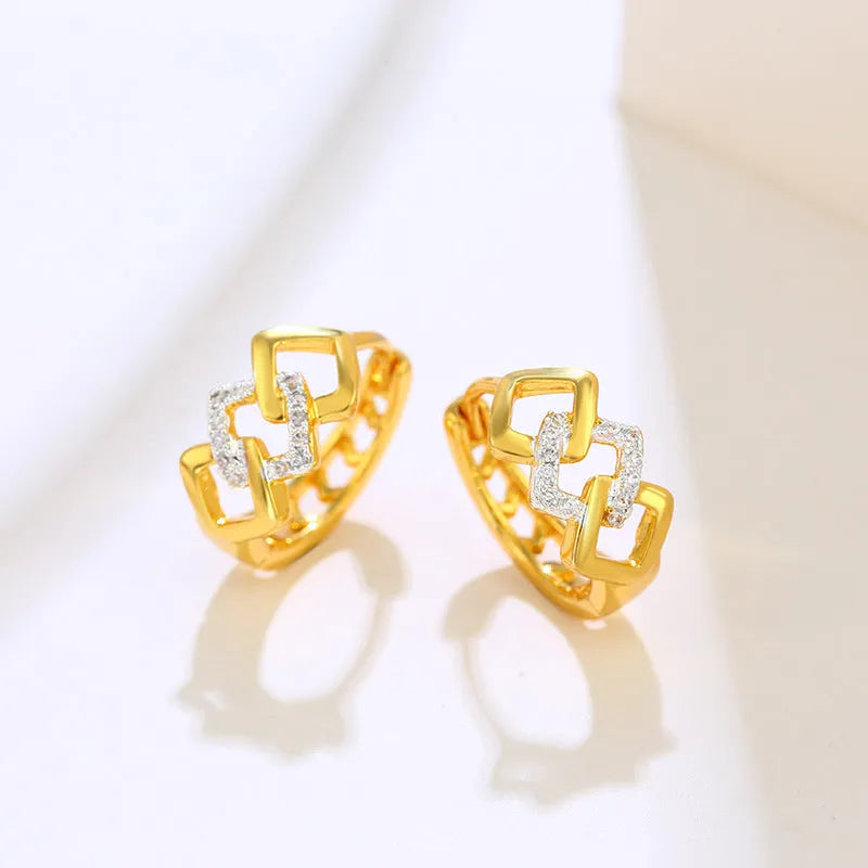 Geometric hollow-out gold earrings with electroplated finish and colour separation design