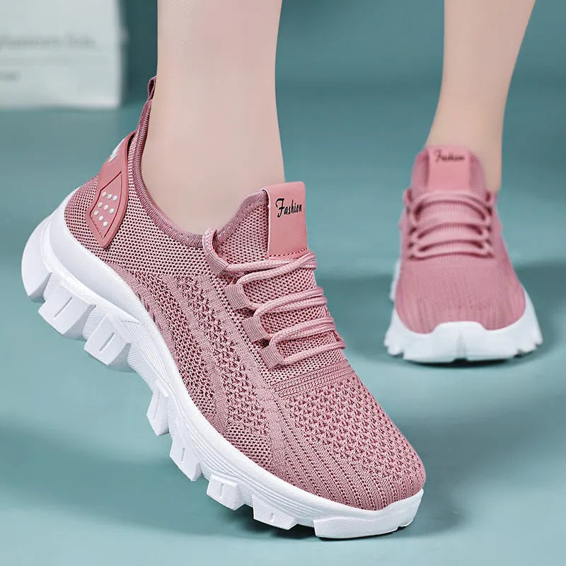 Men's white Flyknit running sneakers with thick PVC sole and lace-up closure