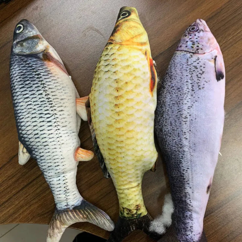 A multicolour electronic jumping fish cat toy measuring 30cm long with a USB charging cable.