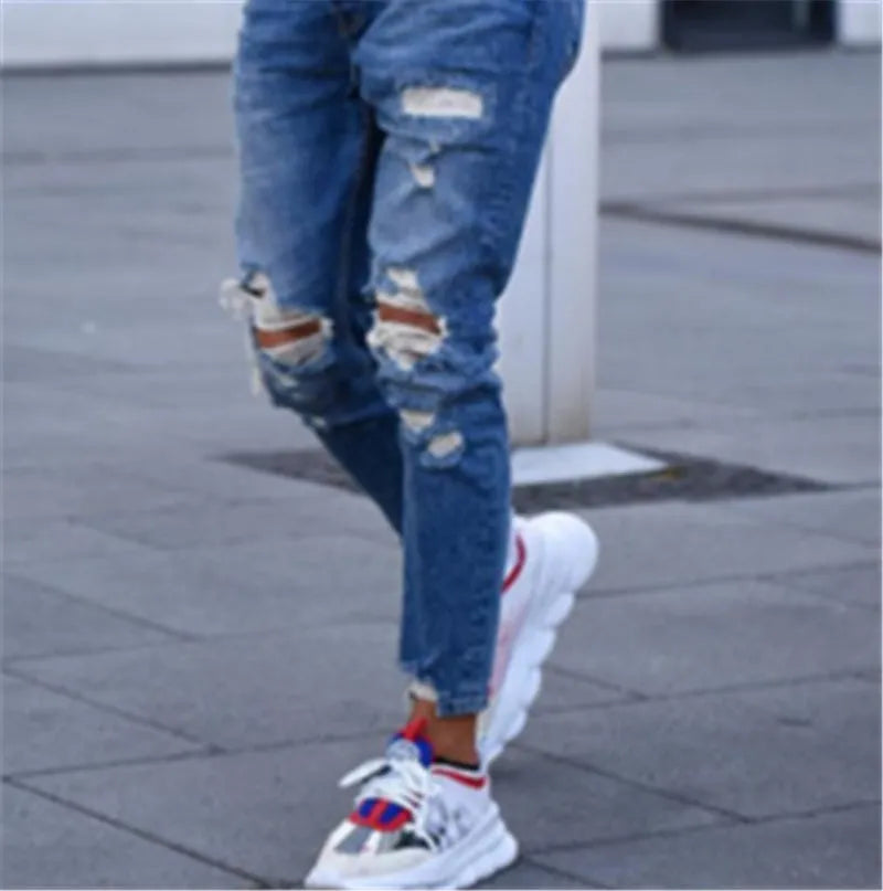 Men's deep blue cotton jeans with distressed holes, showing front and back views