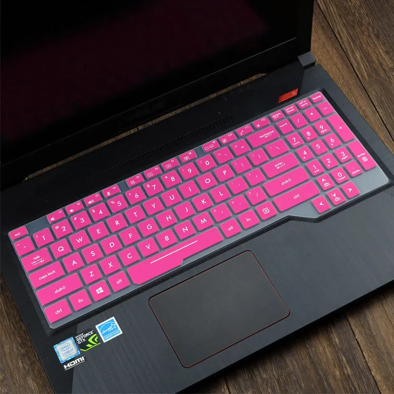 ASUS VivoBook 15 X513 laptop with a translucent mint coloured silicone keyboard protector fitted.