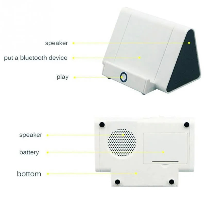 Black and white wireless mini Bluetooth portable speaker for mobile phones and computers.