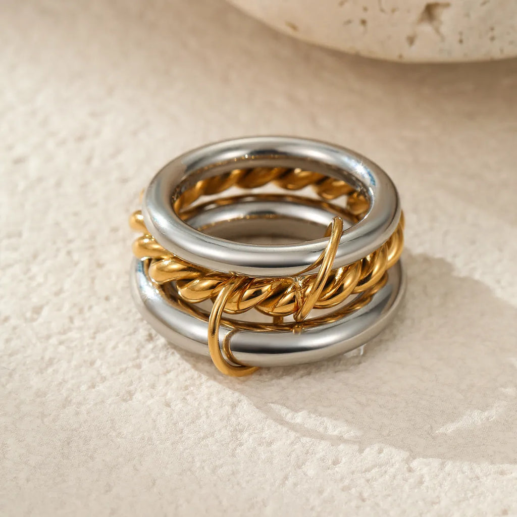 Stacked colour matching stainless steel ring with 18K gold plating and exaggerated design