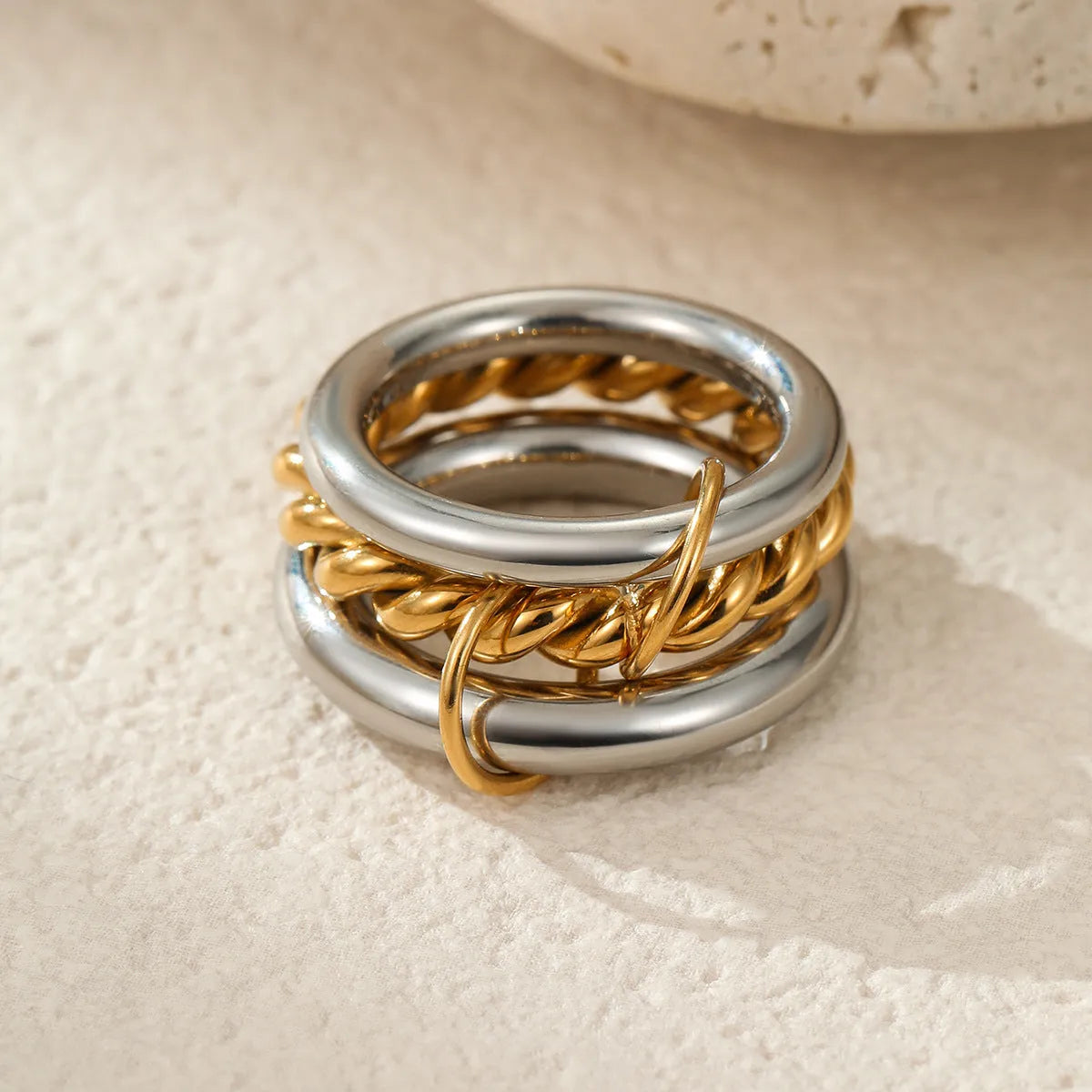 Stacked colour matching stainless steel ring with 18K gold plating and exaggerated design