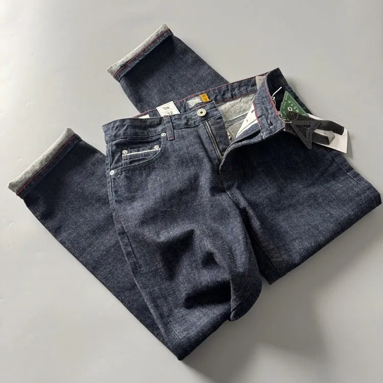 Men's primary colour straight leg jeans with a five-pocket design and mid-rise waist.