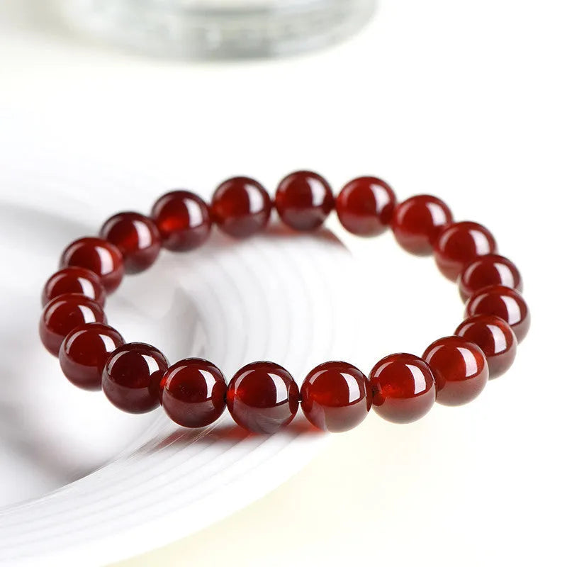 Natural orange red garnet crystal ball bracelet with Ruyi elements in retro unisex design
