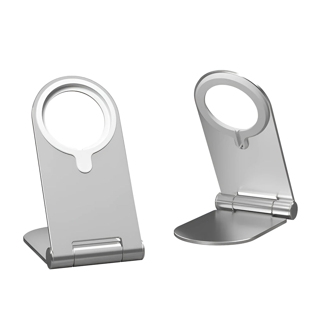 Silver portable magnetic bracket for iPhone 12, showing adjustable vertical stand on a desk.