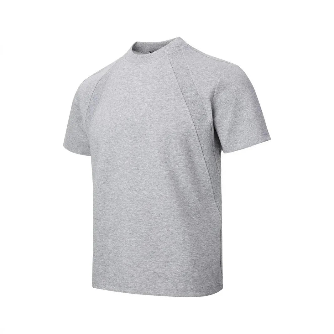 Black loose fit short sleeve top with air layer stitching detail on a hanger