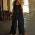 Sleeveless cotton wide leg jumpsuit in retro style shown in Peacock Green colour with side pockets.