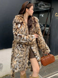 Street fashion faux fur coat with fox-style collar and regular sleeves
