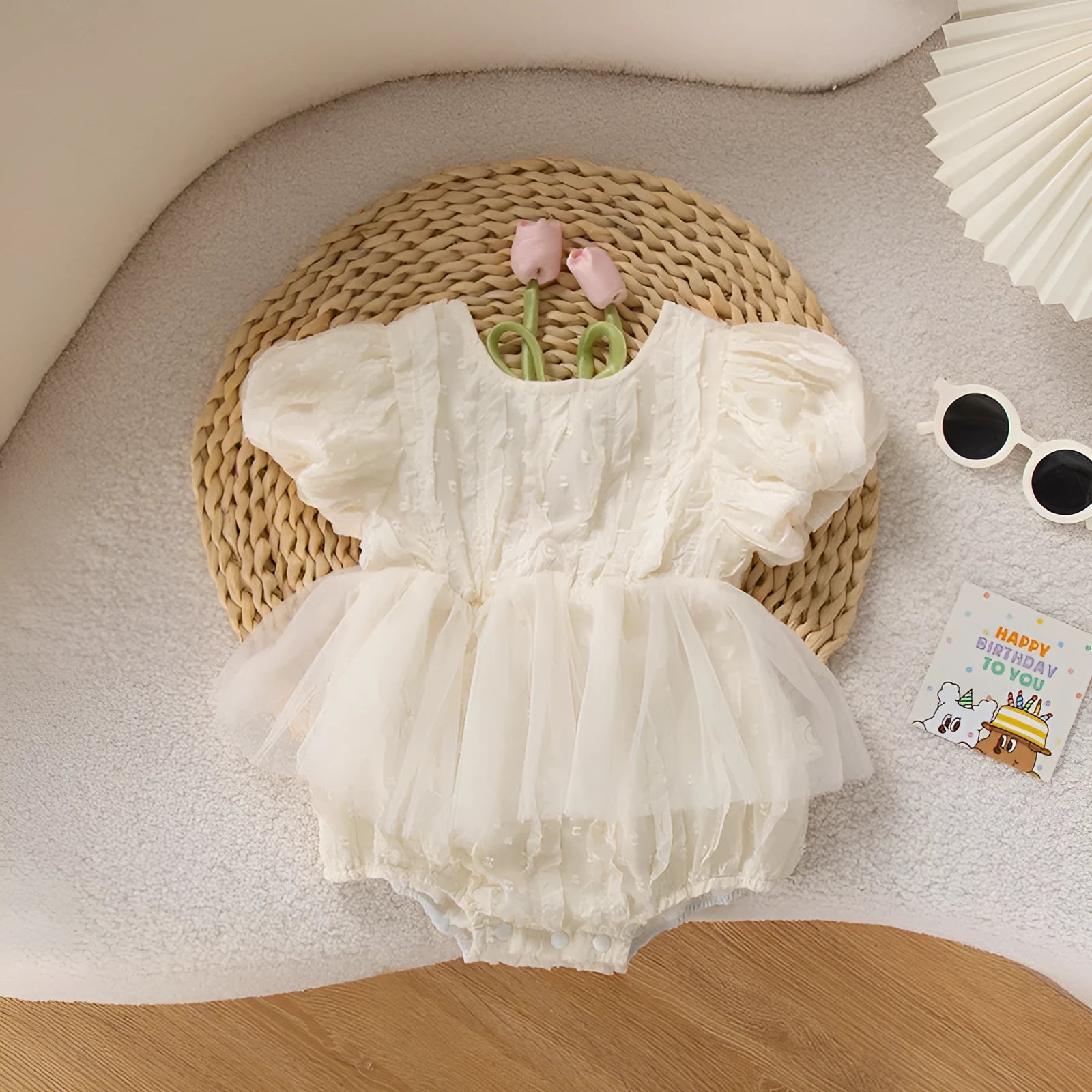 Baby triangle jumpsuit romper in apricot with pullover style and short sleeves