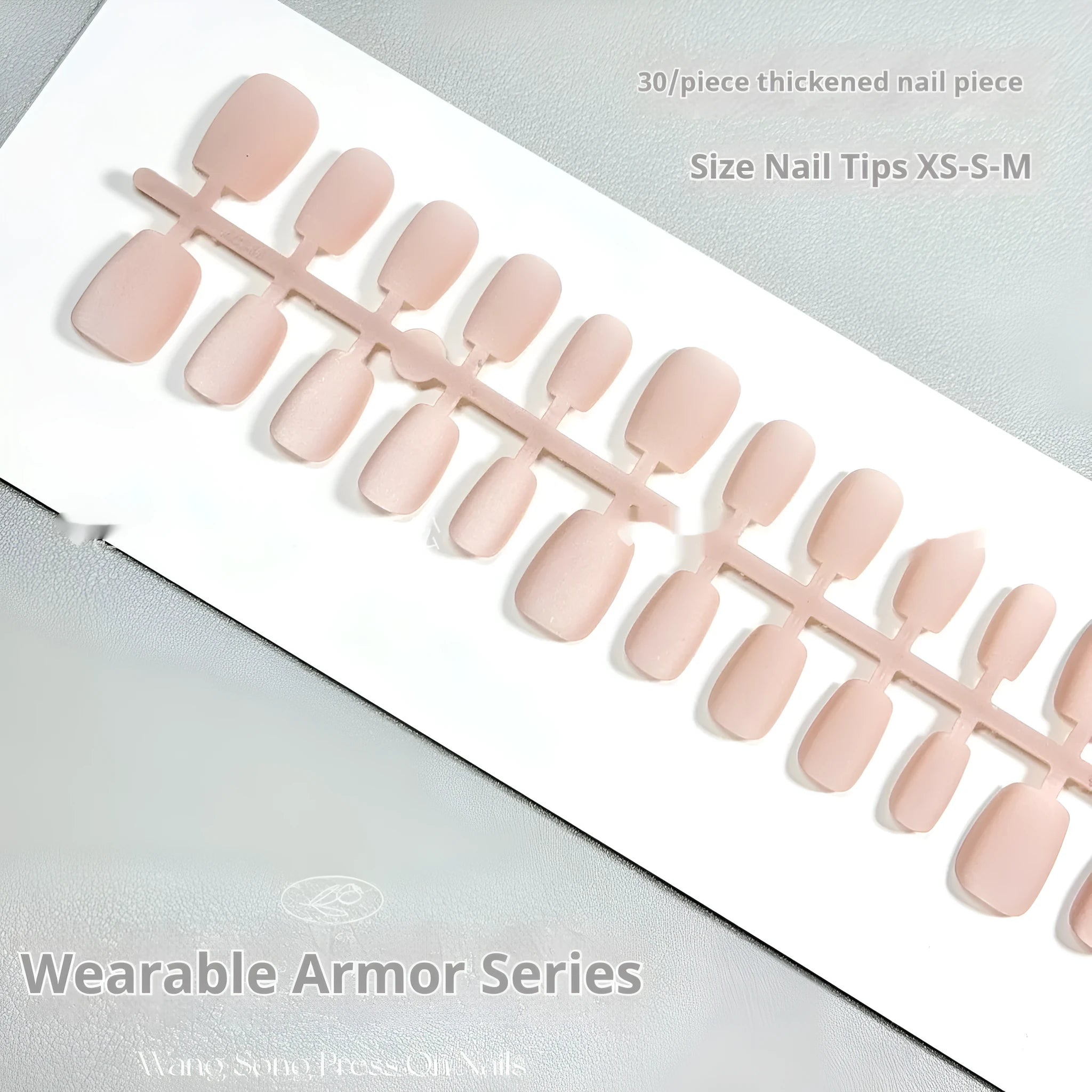 Set of frosted velvet Cat's Eye artificial nails in short ladder style on a clear background.