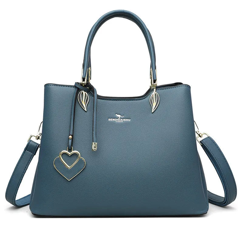 Black women's multi-layer shoulder messenger bag made from PU leather with sewing thread detail.