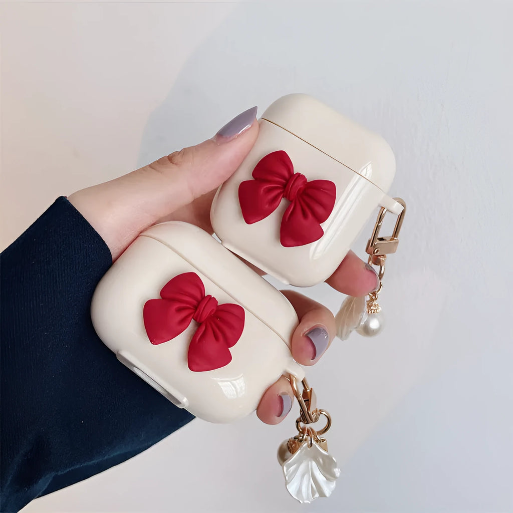 Beige red TPU clamshell earphone case with bow shell design for AirPods protection