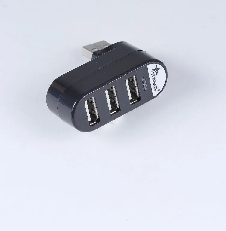 Black and white USB 2.0 hub splitter, a multi-port expansion hub for computers and laptops.