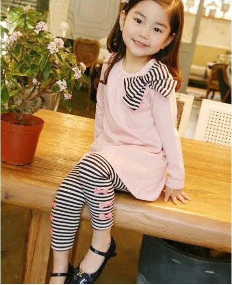 Girls cotton clothing set in pink colour showing complete coordinated outfit for sizes 110-140cm