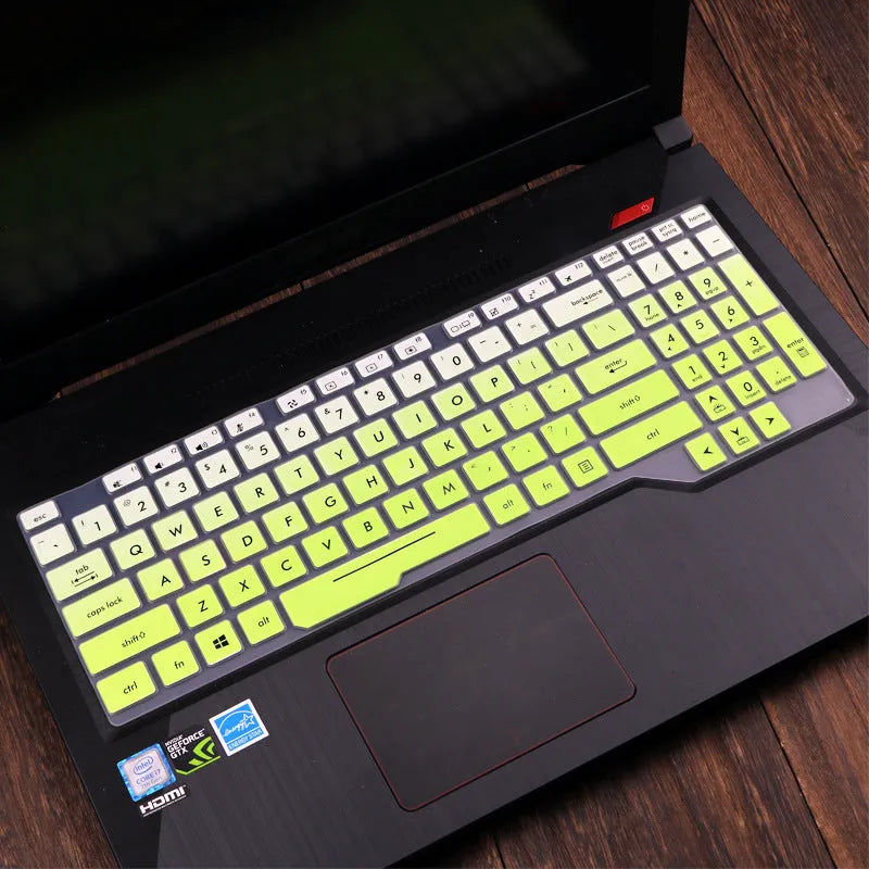 ASUS VivoBook 15 X513 laptop with a translucent mint coloured silicone keyboard protector fitted.