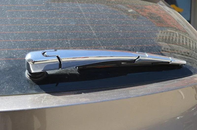 Four silvery ABS plastic rear wiper cover trim caps for a 2010 Hyundai.