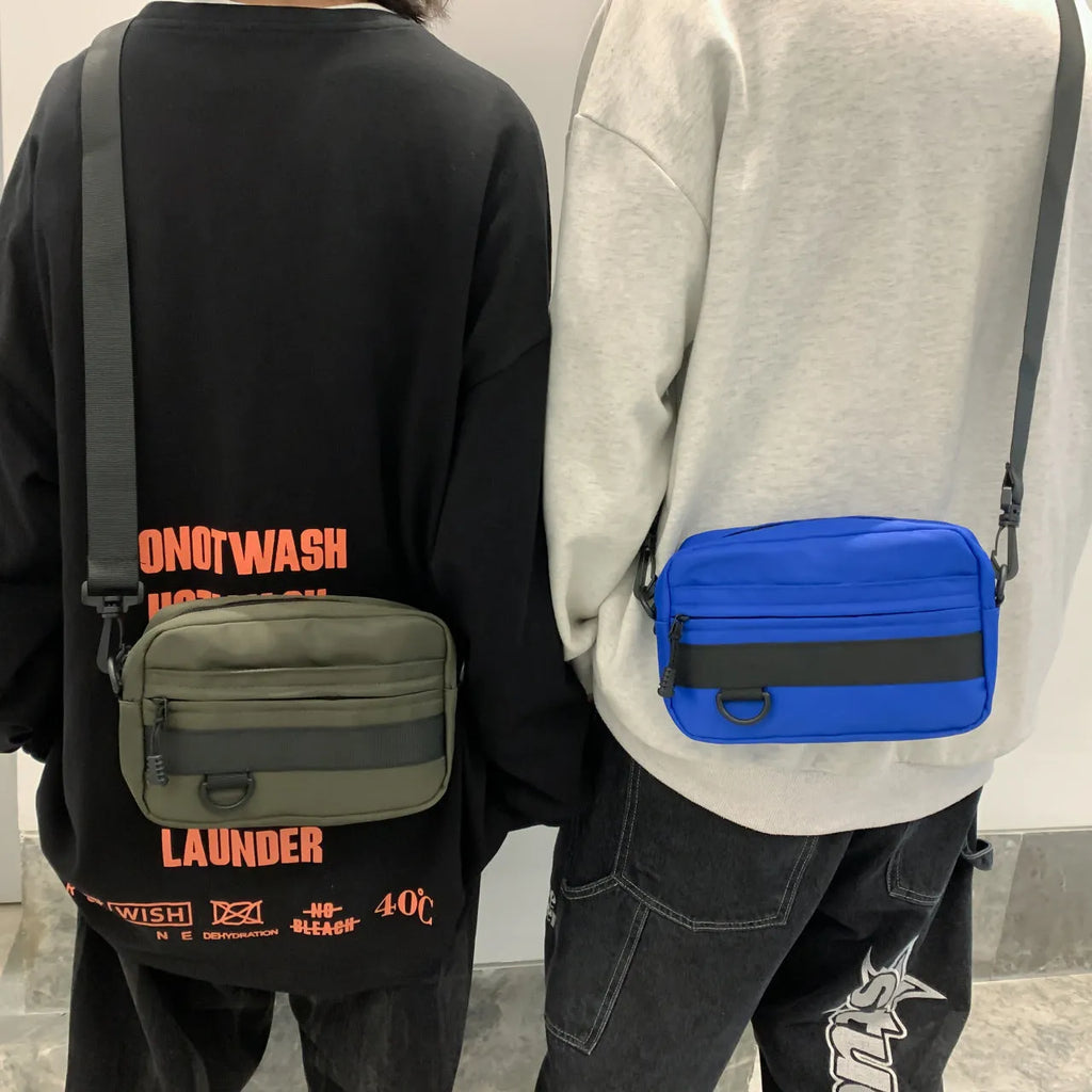 Men's nylon crossbody messenger bag in black blue green or white colours 22cm length