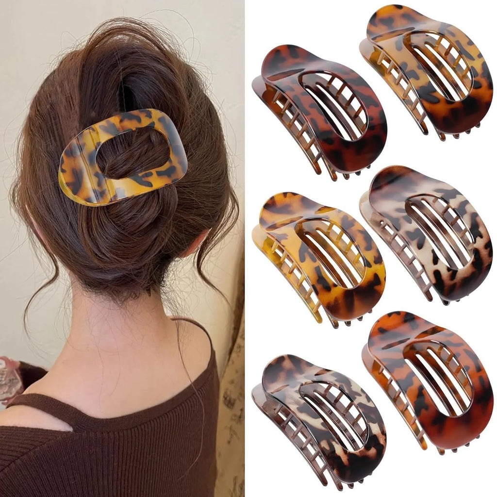 Set of six rose red plastic hair clips with frosted grip and pointed toe design.