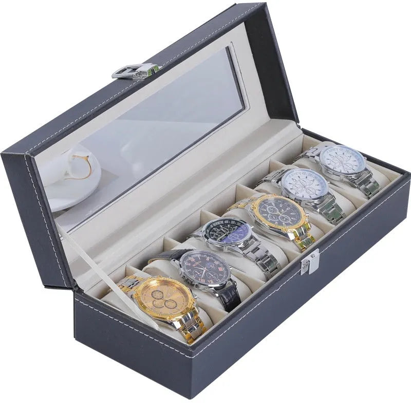 Grey high-grade leather watch storage box with a transparent see-through lid on a wooden surface.