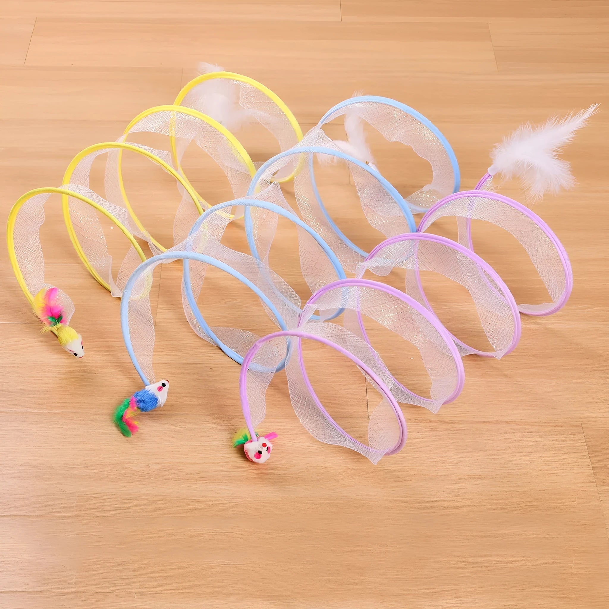 S-type cat tunnel toy with elastic net covering and feather, shown on a floor.