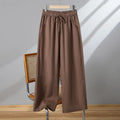 Women's straight-leg casual trousers with elastic waist and lace-up drawstring in apricot colour