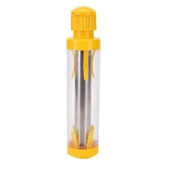Yellow cylindrical corn stripper kitchen tool with stainless steel mechanism on a wooden surface.