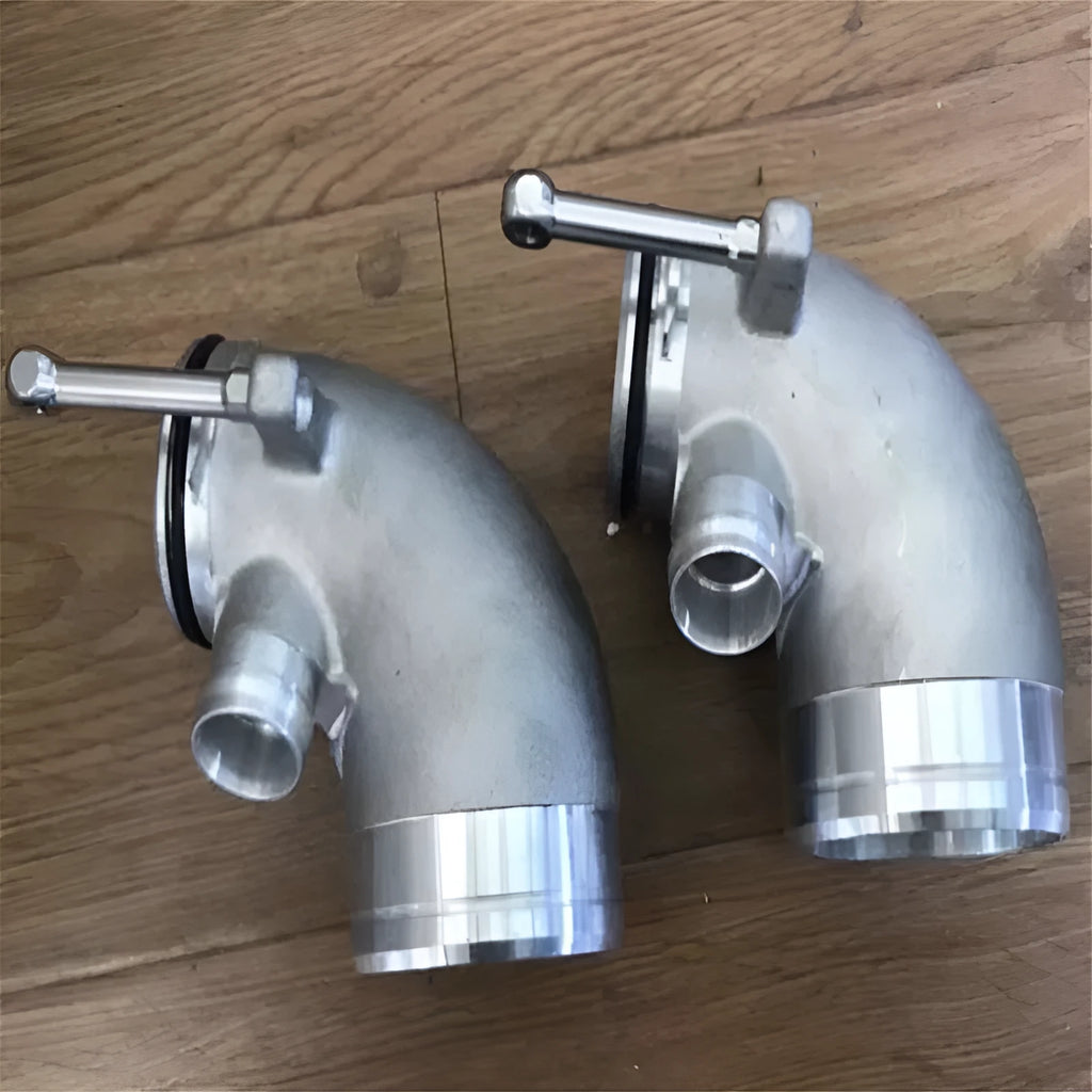 Aluminium alloy 90-degree turbocharger outlet elbow for lateral engine applications