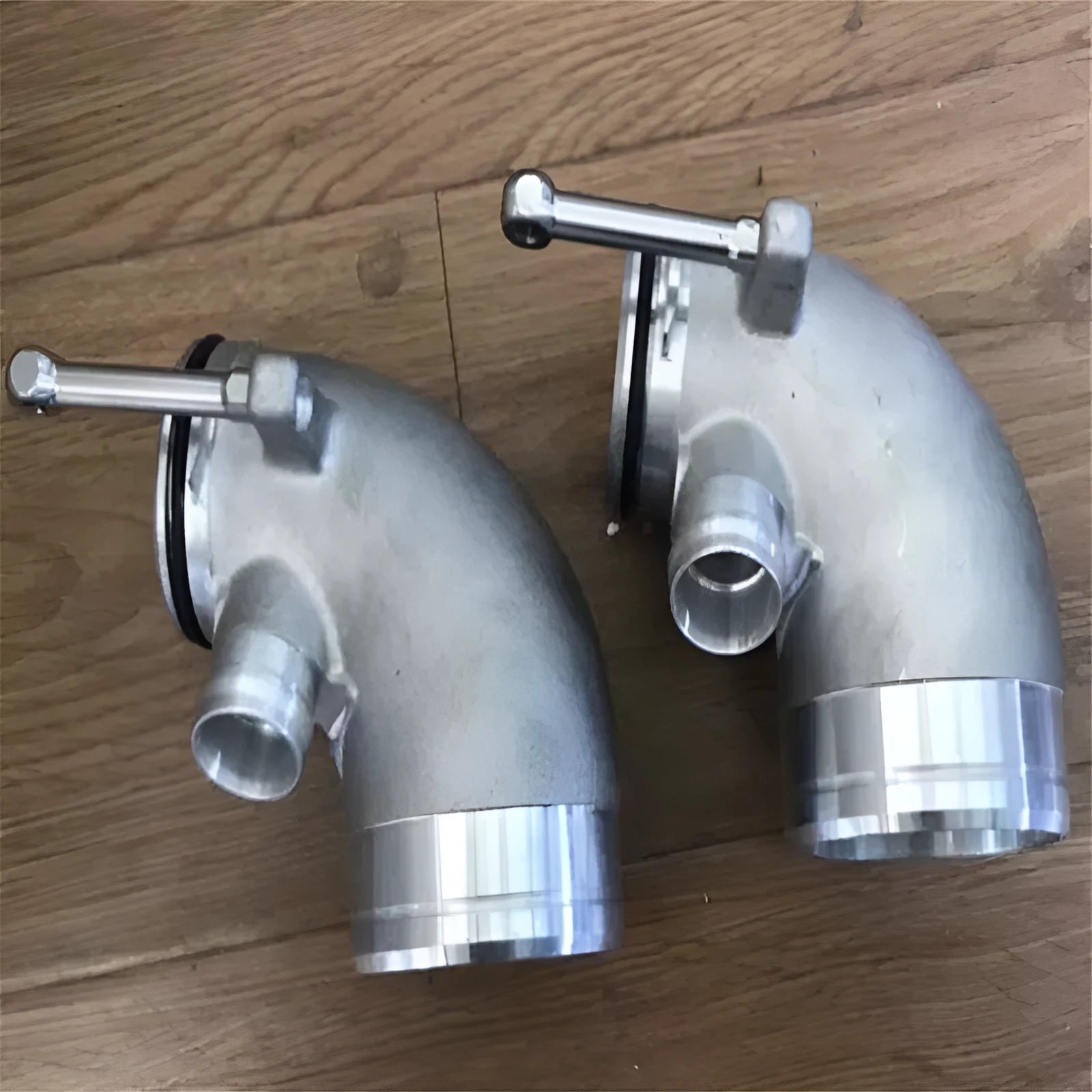 Aluminium alloy 90-degree turbocharger outlet elbow for lateral engine applications