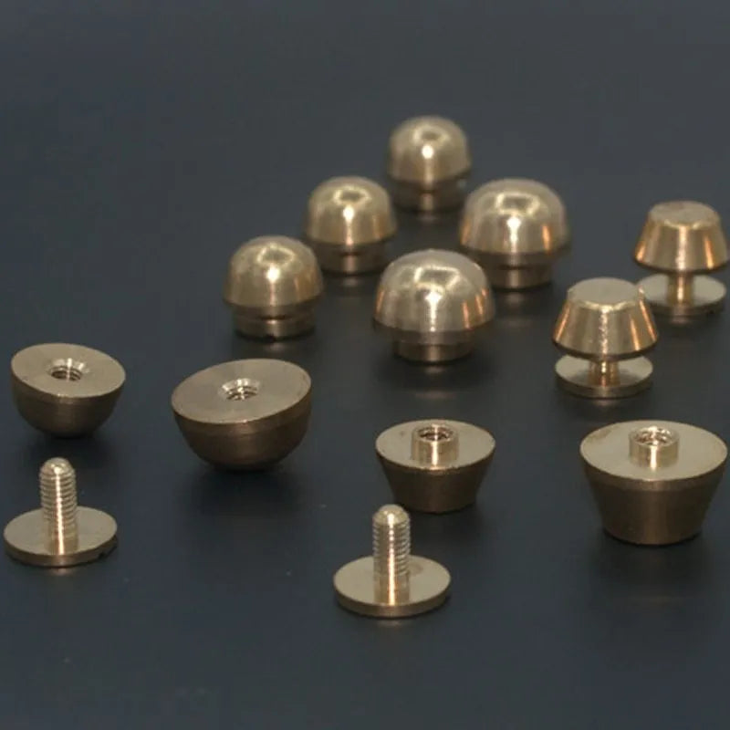 Brass decorative buckles in round and geometric shapes, sizes 10x6mm and 12x7mm.