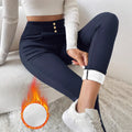 Navy blue women's high-waist straight-leg slim-fit trousers on a white background.