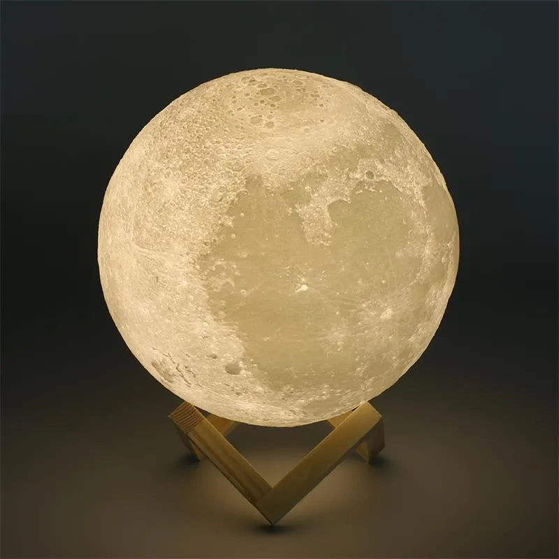 3D printed moon lamp with lunar surface detail on wooden stand, showing touch metal ring at base