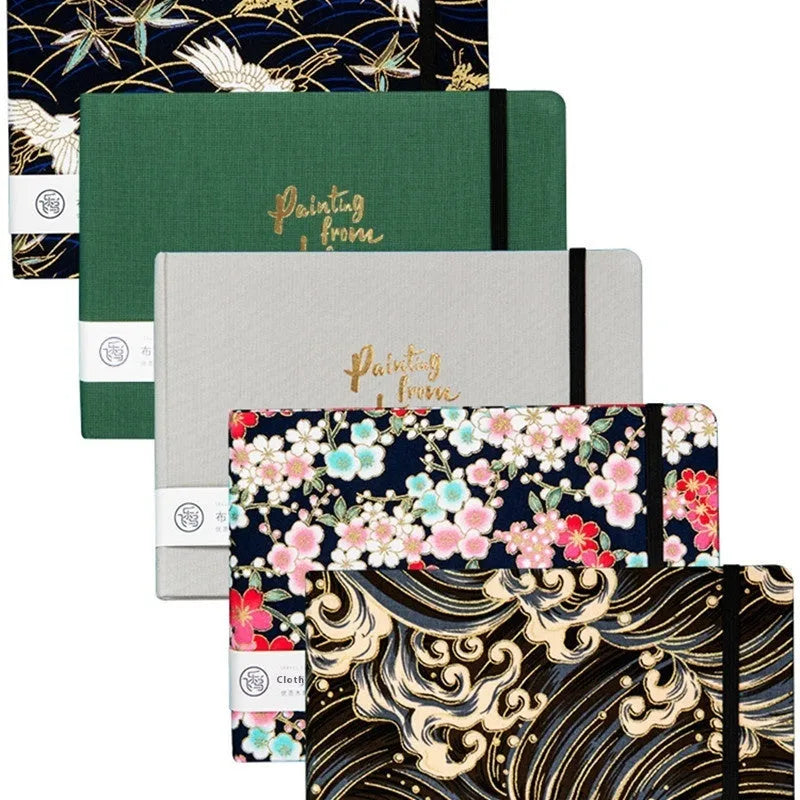Feiluniao handmade fabric watercolour notebook showing cover design, 185mm long.