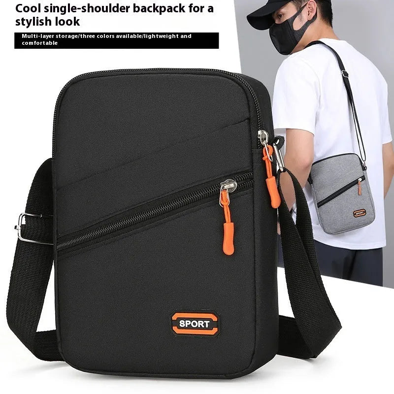 Lightweight oxford cloth crossbody commuter bag in solid colour