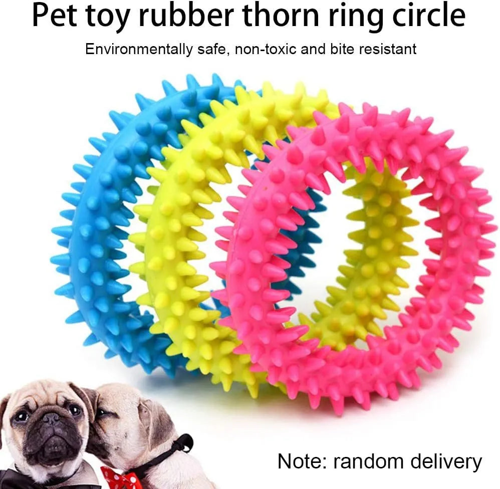 Blue TPR spiky circle dog chew toy on a white background showing dental nubs and ring shape.