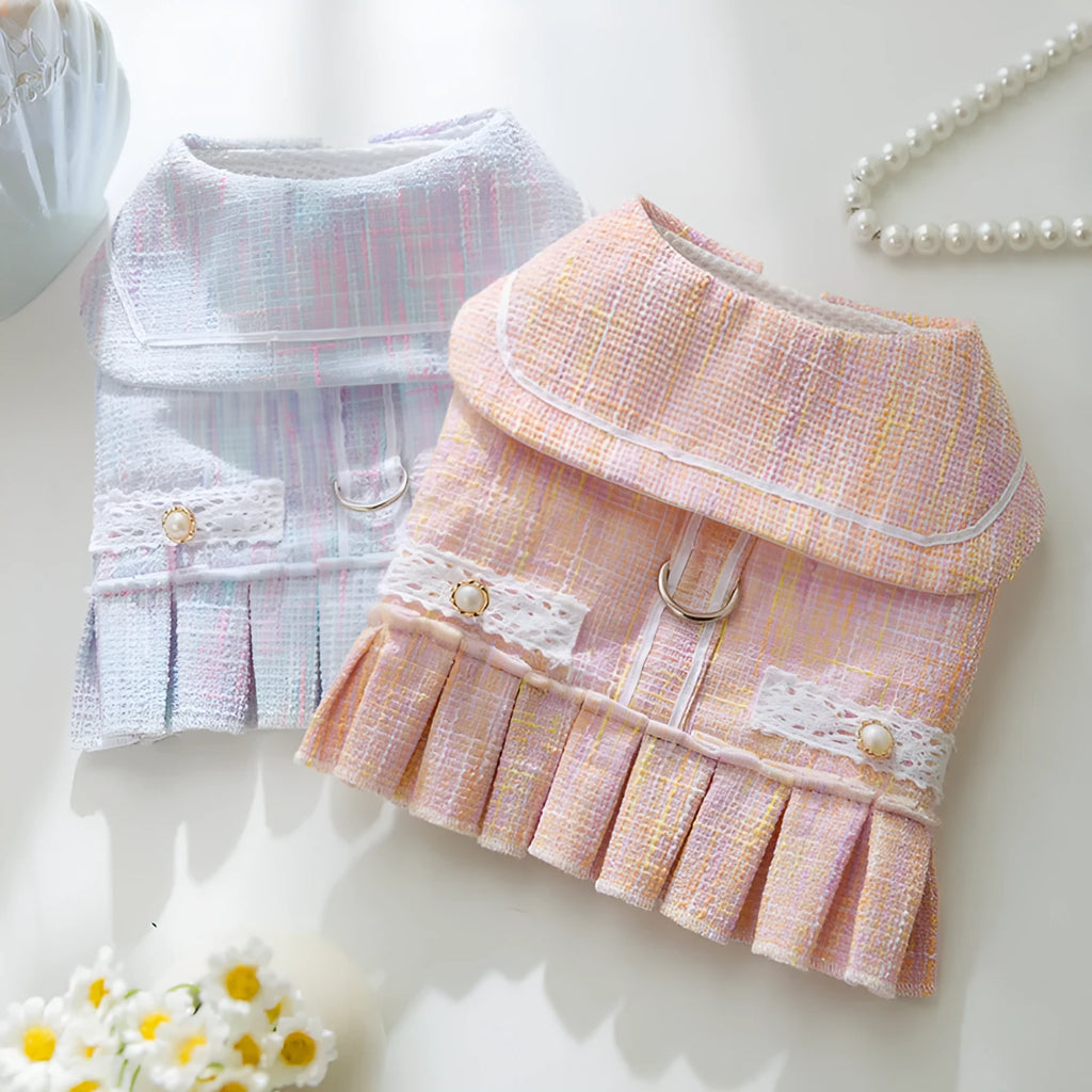 Polyester pet clothes for cats and small dogs in purple and pink colours showing four size options