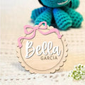 Square wooden baby room ornament with custom name text for wall decoration.
