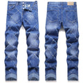 Pearl embroidery street trendy denim skinny pants in blue with mid-rise tapered leg and embroidered pearl details.