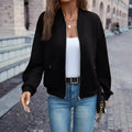 Black women's casual zip jacket with long sleeves and faux pocket detailing