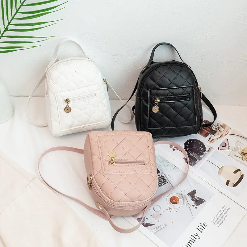 Girls' Korean style embroidered hard backpack in black colour showing sandwich pocket and soft handle