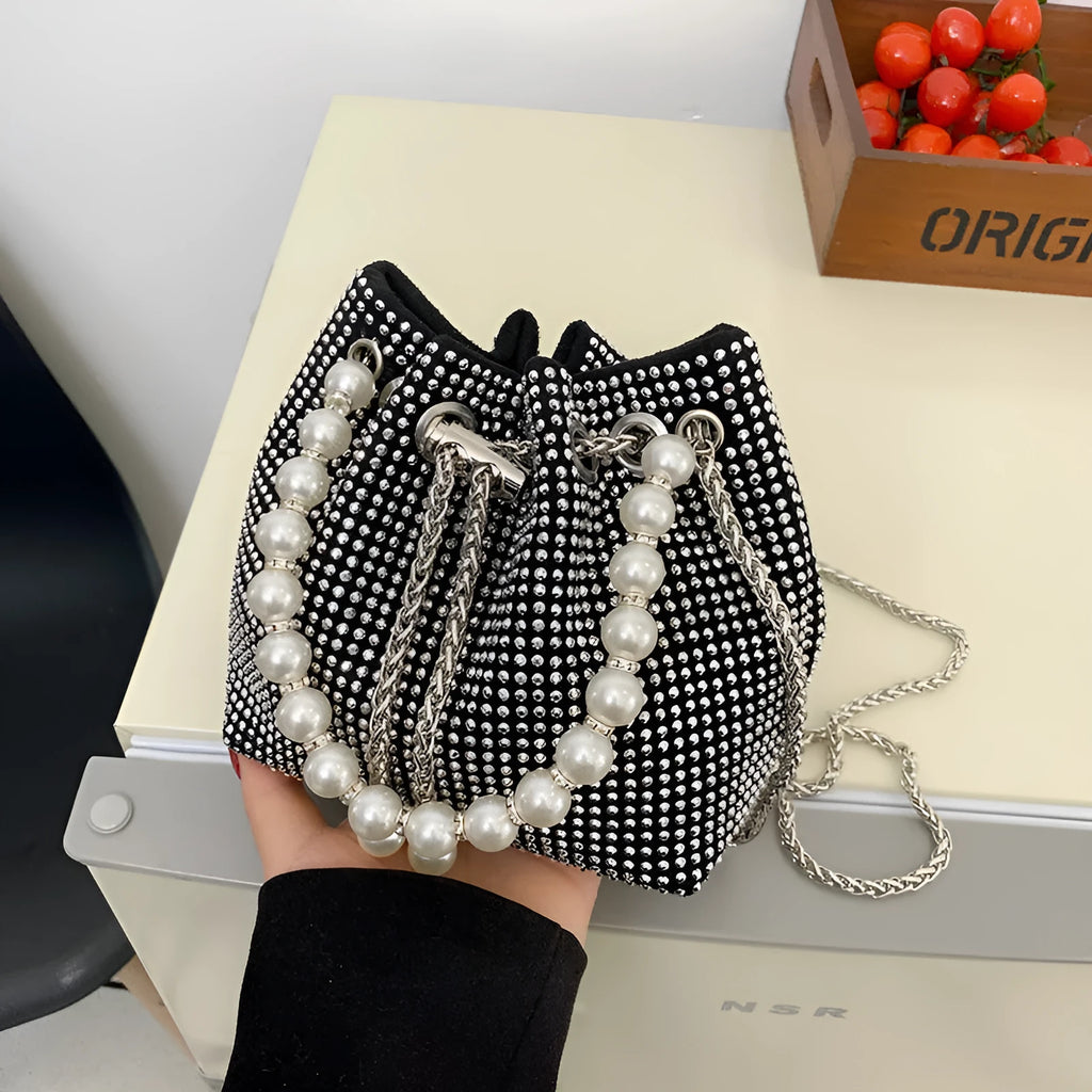 Western style diamond pattern PU leather crossbody bucket bag in black, showing chain strap and external pockets.