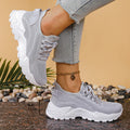 Women's low-top mesh platform sneakers in multiple colours with round toe and lace-up front.