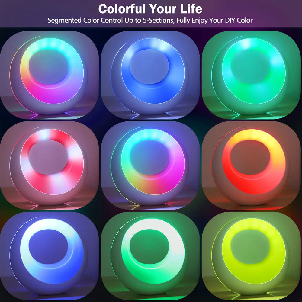 Small RGB colour changing desk lamp with remote control on wooden surface