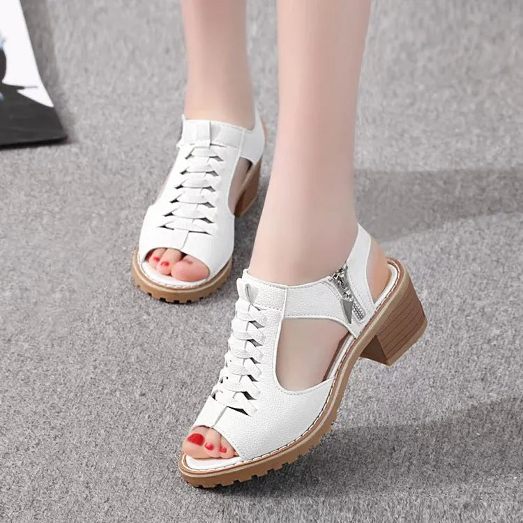 Women's retro-style sandals with a side zipper in a pure colour on a beef tendon sole.